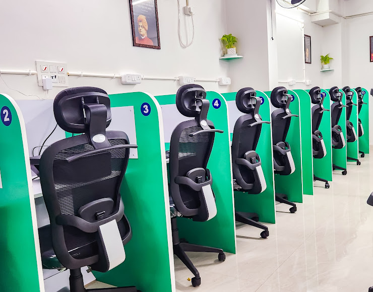 Real Synapz Study Zone interior with green study cabins and ergonomic chairs